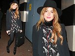 EXCLUSIVE: Actress Lindsay Lohan seen leaving the Playhouse Theatre in London's West End after another performance in the play, 'Speed-the-Plow'. Lindsay slipped out of a side door to try and avoid meeting fans and photographers, but was seen as she exited from the side door. She was photographed wearing a fedora hat with a black suit jacket and trousers, and a black shirt with guns printed all over it.

Pictured: Lindsay Lohan
Ref: SPL874330  251014   EXCLUSIVE
Picture by: WeirPhotos / Splash News

Splash News and Pictures
Los Angeles: 310-821-2666
New York: 212-619-2666
London: 870-934-2666
photodesk@splashnews.com