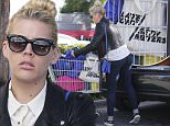 EXCLUSIVE: Busy Philipps loaded up her car after shopping at Whole Foods in West Hollywood,CA\n\nPictured: Busy Philipps \nRef: SPL892620  171114   EXCLUSIVE\nPicture by: Ako/Splash News\n\nSplash News and Pictures\nLos Angeles: 310-821-2666\nNew York: 212-619-2666\nLondon: 870-934-2666\nphotodesk@splashnews.com\n