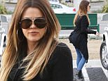 Khloe Kardashian starts her holiday shopping at Crate and Barrel with a friend in Calabasas. November 18, 2014 X17online.com