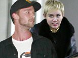 129325, EXCLUSIVE: Miley Cyrus and Patrick Schwarzenegger have a romantic date night in LA. The couple started their evening \nating an eve event for MAC Cosmetics and MAC AIDS Fund premiere of the HIV/AIDS documentary "It's ver&quer" beforeng aing a romantic dinner at RivaBella in West Hollywood. Miley dressed up for the date and wore a very rare vintage 80's Chanel choker, that costs $6,800, ripped jeans and sexy pink stiletto heels. Los Angeles, California - Tuesday November 18, 2014. Photograph: Juan Sharma/Bruja, © PacificCoastNews. Los Angeles Office: +1 310.822.0419 sales@pacificcoastnews.com FEE MUST BE AGREED PRIOR TO USAGE