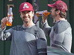 EXCLUSIVE: Irn-Bru gets Gerard Butler Through as the Scottish actor was pictured with his favourite native soda drink outside the 'Ye Olde Kings Head Pub' in Santa Monica. The '300' star, who just turned 45 years old, was spotted leaving the British Pub with some mates after watching Scotland lose to England and popped into the pub shop to console himself with the famed orange fizzy drink. He was also pictured with his flies undone as he showed off his black and white underwear while cleaning his phone screen on his shirt. Fashioning some salt and pepper stubble, the heartthrob looked in good spirits wearing a crimson baseball cap and also showed how charitable he was by giving a homeless man a donation after chatting to him outside of the bar. 'Irn-Bru' is Scotland's most popular soft drink with their slogan reading 'Irn-Bru Gets You Through'.\n\nPictured: Gerard Butler\nRef: SPL893035  181114   EXCLUSIVE\nPicture by: Splash News\n\nSplash News and Pictur