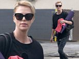 Picture Shows: Charlize Theron  December 05, 2014\n \n "Mad Max: Fury Road" star Charlize Theron enjoys some time to herself as she goes to a yoga class in West Hollywood, California. Charlize dressed casually in a black sweater and print leggings.\n \n Non-Exclusive\n UK RIGHTS ONLY\n \n Pictures by : FameFlynet UK  2014\n Tel : +44 (0)20 3551 5049\n Email : info@fameflynet.uk.com