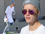 EXCLUSIVE: ***PREMIUM RATES APPLY*** Justin Bieber covers his freshly dyed blonde hair, while skateboarding in LA! Bieber, who dyed his hair yesterday, covered up with a wooly hat in the warm LA weather. His blonde hair was clearly visible as it peeked through under his beanie hat. Bieber spent the day incognito as he practiced his skateboard tricks in Venice Skate park on the beach in LA. Bieber was accompanied by a couple of friends, his dad, security guards and a couple of female friends who watched and filmed him while he took the day off to relax. Bieber was seen stopping off for ice-cream and using the public restroom before leaving the beach.\n\nPictured: Justin Bieber\nRef: SPL906556  061214   EXCLUSIVE\nPicture by: Splash News\n\nSplash News and Pictures\nLos Angeles: 310-821-2666\nNew York: 212-619-2666\nLondon: 870-934-2666\nphotodesk@splashnews.com\n