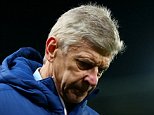 STOKE ON TRENT, ENGLAND - DECEMBER 06:  Arsenal Manager Arsene Wenger walks off at the end of the Barclays Premier League match between Stoke City and Arsenal  at the Britannia Stadium on December 6, 2014 in Stoke on Trent, England.  (Photo by Clive Mason/Getty Images)