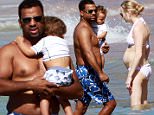 Picture Shows: Alfonso Ribeiro Jr., Alfonso Ribeiro, Angela Unkrich  December 07, 2014\n \n ** min web / nline fee £400 for set **\n \n 'The Fresh Prince Of Bel Air' actor Alfonso Ribeiro enjoy a dip in the ocean with his pregnant wife Angela Unkrich and their son Alfonso Ribeiro Jr. in Maui, Hawaii. \n \n The couple announced that Angela was pregnant with their second child in October. \n \n ** min web / nline fee £400 for set **\n \n Exclusive All Rounder\n UK RIGHTS ONLY\n Pictures by : FameFlynet UK © 2014\n Tel : +44 (0)20 3551 5049\n Email : info@fameflynet.uk.com