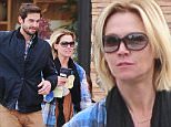 NATIONAL PHOTO GROUP  Jennie Garth walks arm and arm with a mystery man while taking her girls to make Christmas ornaments at Color Me Mine children's art studio in Studio City on Friday. Job: 122014J3  Non-Exclusive Dec. 19th 2014 Studio City, CA NPG.com