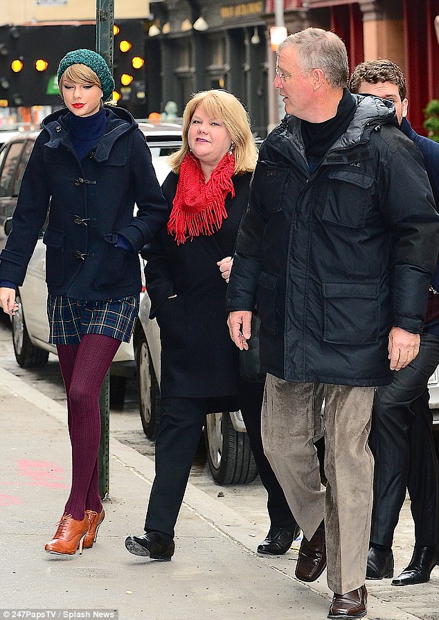 Stepping out: The Blank Space singer showed off her slender legs in purple woolly tights