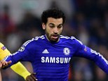 Sporting Lisbon's Silva William Carvalho (left) and Chelsea's Mohamed Salah battle for the ball during the UEFA Champions League Group G match at Stamford Bridge, London.