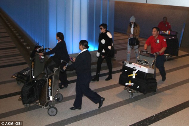 First class arrival: Both Kris and Kendall appeared to have lots of luggage between the two of them