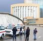 Libyan security forces and emergency services surround Tripoli's central Corinthia Hotel on January 27, 2015 ©Mahmud Turkia (AFP)