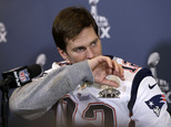New England Patriots quarterback Tom Brady listens to a question during a news conference Wednesday, Jan. 28, 2015, in Chandler, Ariz. The Patriots play the Seattle Seahawks in NFL football Super Bowl XLIX Sunday, Feb. 1, in Phoenix. (AP Photo/Mark Humphrey)