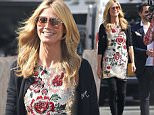 132183, Heidi Klum seen in a sequined floral mini and thigh high boots on the set of 'Germany's Next Top Model' shooting in LA. Los Angeles, California - Wednesday February 4, 2015. Photograph: Miguel Aguilar/JS, © PacificCoastNews. Los Angeles Office: +1 310.822.0419 sales@pacificcoastnews.com FEE MUST BE AGREED PRIOR TO USAGE