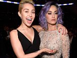 LOS ANGELES, CA - FEBRUARY 08:  Miley Cyrus and Katy Perry attend The 57th Annual GRAMMY Awards at STAPLES Center on February 8, 2015 in Los Angeles, California.  (Photo by Kevin Mazur/WireImage)