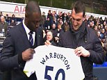 King and Warburton poseat half-time of the north London derby at White Hart Lane