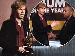 Beck accepts the award for album of the year for ìMorning Phaseî at the 57th annual Grammy Awards on Sunday, Feb. 8, 2015, in Los Angeles. (Photo by John Shearer/Invision/AP)
