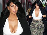 Mandatory Credit: Photo by Startraks Photo/REX (4422450h)\n Kim Kardashian\n Kim Kardashian out and about, New York, America - 09 Feb 2015\n Kim Kardashian strolling in Soho\n