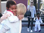 Picture Shows: Charlize Theron, Jackson Theron  February 09, 2015
 
 'Mad Max: Fury Road' actress Charlize Theron spotted taking her son Jackson to his karate class in Los Angeles, California.
 
 Jackson was excited to give his mother a big hug as she tried to put him in the car. 
 
 Exclusive - All Round
 UK RIGHTS ONLY
 
 Pictures by : FameFlynet UK    2015
 Tel : +44 (0)20 3551 5049
 Email : info@fameflynet.uk.com