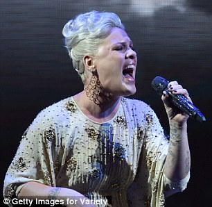 Wardrobe change: Although just as modest as on the red carpet, Pink had a completely different gown for her performance