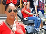 EXCLUSIVE: Pregnant Tamera Mowry rides a scooter at disneyland as she enjoys the day with her family. She was seen sitting and riding on the scooter the whole day as she spent the very hot day at disneyland while her family rode rides she stayed behind but seemed very happy the entire time. she was also seen walking around with her son Aden Houseley showing him the different areas of the park. \nTamera is 7 months pregnant according to her twitter feed\n\nPictured: Tamera Mowry and Aden Housley\nRef: SPL974228  160315   EXCLUSIVE\nPicture by: Fern / Splash News\n\nSplash News and Pictures\nLos Angeles: 310-821-2666\nNew York: 212-619-2666\nLondon: 870-934-2666\nphotodesk@splashnews.com\n