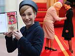 Dame Kristin Scott Thomas is made a Dame Commander of the British Empire by Queen Elizabeth II during an Investiture ceremony at Buckingham Palace, London. PRESS ASSOCIATION Photo. Picture date: Wednesday March 19, 2015. See PA story ROYAL Investiture. Photo credit should read: Jonathan Brady/PA Wire