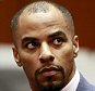 Former National Football League star Darren Sharper (L) and his attorney Leonard Levine (R) appear at the Clara Shortridge Foltz Criminal Justice Center in Los Angeles, California March 23, 2015. Sharper pleaded no contest on Monday to charges in Los Angeles of drugging four women and raping two of them, after receiving a nine-year prison sentence for a sexual assault case in Arizona.  REUTERS/Nick Ut/Pool