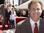 Will Ferrell, back row, from left, back row, Viveca Ferrell and, front row, from left, their sons Magnus, Axel and Mattias pose alongside Ferrell's new star on the Hollywood Walk of Fame following a ceremony honoring him on Tuesday, March 24, 2015, in Los Angeles. (Photo by Chris Pizzello/Invision/AP)