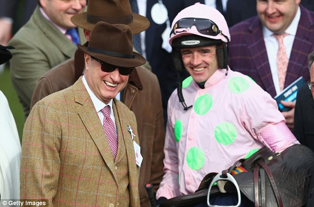Owner Rich Ricci (left) and jockey Ruby Walsh in the familiar pink silks with green spots