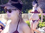 EXCLUSIVE: Pregnant Ashlee Simpson shows off her growing bump in a wine color bikini as she enjoys the Easter holiday with her husband Evan Ross in Los Cabos, Mexico.\n\nPictured: Ashlee Simpson\nRef: SPL986320  280315   EXCLUSIVE\nPicture by: Clasos.com.mx / Splash News\n\nSplash News and Pictures\nLos Angeles: 310-821-2666\nNew York: 212-619-2666\nLondon: 870-934-2666\nphotodesk@splashnews.com\n