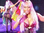 Nicky Minaj Holds Irish Flags While Showing Off Her Large Posterior In Fishnet Bodysuit, In Dublin, Ireland! Nicki Minaj brought her Pink Print tour to the 3 Arena in Dublin Ireland and left little to the imagination for her adoring fans. She showed her large arse off in skimpy costumes throughout the show. In true Irish fashion, Dublin fans threw multiple Irish flags on the stage for her. She politely picked them up and walked around the stage while still singing her new track, "The Night Is Still Young". 

Pictured: Nicki Minaj
Ref: SPL981151  310315  
Picture by: Nina / Splash News

Splash News and Pictures
Los Angeles: 310-821-2666
New York: 212-619-2666
London: 870-934-2666
photodesk@splashnews.com