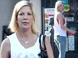 135101, EXCLUSIVE: Tori Spelling goes grocery shopping at Gelson's Market in Sherman Oaks, LA.  Los Angeles, California - Friday April 3, 2015. Photograph: © PacificCoastNews. Los Angeles Office: +1 310.822.0419 sales@pacificcoastnews.com FEE MUST BE AGREED PRIOR TO USAGE