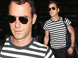 Los Angeles, CA - Handsome Justin Theroux touches down at LAX in a striped shirt, black denim jeans, and brown suede shoes.  \nAKM-GSI        April 4, 2015\nTo License These Photos, Please Contact :\nSteve Ginsburg\n(310) 505-8447\n(323) 423-9397\nsteve@akmgsi.com\nsales@akmgsi.com\nor\nMaria Buda\n(917) 242-1505\nmbuda@akmgsi.com\nginsburgspalyinc@gmail.com