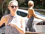 Please contact X17 before any use of these exclusive photos - x17@x17agency.com   PREMIUM EXCLUSIVE - Kate Hudson was spotted in a delightful summer dress,  her hair pulled back into a braid, with sunglasses, preparing for the upcoming Coachella music festival.  Friday, April 3, 2015 X17online.com
