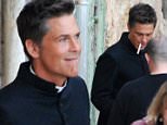 EXCLUSIVE: Rob Lowe was spotted in Valletta Malta today on the set of apocalypse slough. He is seen petting a dog with a nun having hair arranged and also smoking a cigarette. \n\nRef: SPL995710  130415   EXCLUSIVE\nPicture by: Mark ZC / Splash News\n\nSplash News and Pictures\nLos Angeles:\t310-821-2666\nNew York:\t212-619-2666\nLondon:\t870-934-2666\nphotodesk@splashnews.com\n
