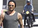David Beckham stops off for a health shake with a friend on 3rd street in West Hollywood. He then drove off on his motorcycle
Featuring: David Beckham
Where: Los Angeles, California, United States
When: 13 Apr 2015
Credit: Owen Beiny/WENN.com