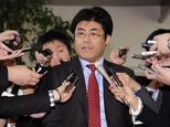 Tatsuya Kato, the former Seoul bureau chief of Japan's conservative Sankei Shimbun newspaper, speaks to reporters after he met with Japanese Prime Minister S...