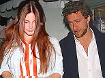 Lana Del Rey leaving dinner in stripes at Giorgio Baldi with an unknown man who is not her boyfriend.    April 15, 2015 X17online.com