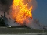 A fireball erupts after a large gas pipeline exploded in Fresno, Calif., Friday, April 17, 2015. The explosion and fire closed both directions of Highway 99, authorities said. (Kevin Ling via AP) MANDATORY CREDIT