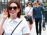 Picture Shows: Anne Hathaway, Adam Shulman  April 17, 2015\n \n Couple Anne Hathaway and Adam Shulman are spotted out for a stroll together in New York City, New York. Anne looked pretty in a pink pleated midi skirt with a white scalloped shirt and white sneakers.  \n \n Non Exclusive\n UK RIGHTS ONLY\n \n Pictures by : FameFlynet UK © 2015\n Tel : +44 (0)20 3551 5049\n Email : info@fameflynet.uk.com