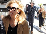 19.APRIL.2015 - LOS ANGELES - USA
DIRECTOR SAM TAYLOR-JOHNSON AND HUSBAND ACTOR AARON TAYLOR JOHNSON WERE SPOTTED AT LAX AIRPORT MAKING THEY WAY THROUGH THE CROWDED TERMINAL.  
BYLINE MUST READ : XPOSUREPHOTOS.COM
*AVAILABLE FOR UK SALE ONLY*
***UK CLIENTS - PICTURES CONTAINING CHILDREN PLEASE PIXELATE FACE PRIOR TO PUBLICATION ***
*UK CLIENTS MUST CALL PRIOR TO TV OR ONLINE USAGE PLEASE TELEPHONE 0208 344 2007*