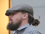 ***MANDATORY BYLINE TO READ INFPhoto.com ONLY***
Leonardo Dicaprio tries to hide under his cap while out for some retail therapy on Madison Avenue in New York city today. 
infusny-198

Pictured: Leonardo Dicaprio
Ref: SPL1003316  180415  
Picture by: INFphoto.com
