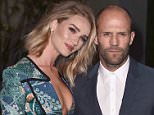 Rosie Huntington-Whiteley, left, and Jason Statham attend Burberry's "London in Los Angeles" event at the Griffith Observatory in Los Angeles, on Thursday, April 16, 2015. (Photo by Jordan Strauss/Invision/AP)