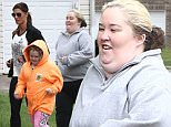 Picture Shows: Natasha Kufa, Alana 'Honey Boo Boo' Thompson, Lauryn 'Pumpkin' Shannon, June 'Mama June' Shannon  April 22, 2015\n \n ** Min Web / Online £150 For Set **\n \n 'Here Comes Honey Boo Boo' star Mama June Shannon gets a home visit from her personal trainer Natasha Kufa in Hammond, Georgia. Natasha showed June how to make several healthy meals and smoothies to help her reach her fitness goal of losing 100 pounds. She also taught her several exercises the family could do around the neighborhood. \n \n ** Min Web / Online £150 For Set **\n \n EXCLUSIVE ALL ROUNDER\n UK RIGHTS ONLY\n Pictures by : FameFlynet UK © 2015\n Tel : +44 (0)20 3551 5049\n Email : info@fameflynet.uk.com