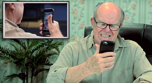 Not a fan: Don (pictured) struggles to take a selfie in the latest Elders React video, in which he and other senior citizens learn about the photo messaging app Snapchat 