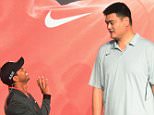 Mandatory Credit: Photo by Imaginechina/REX Shutterstock (4710568c)
 Tiger Woods and retired basketball star Yao Ming
 Tiger Woods teaches Yao Ming to play golf, Nike headquarters, Shanghai, China - 24 Apr 2015