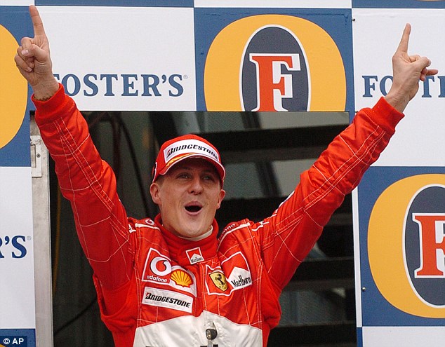 Schumacher celebrates on the podium after winning the Australian Grand Prix in March 2004