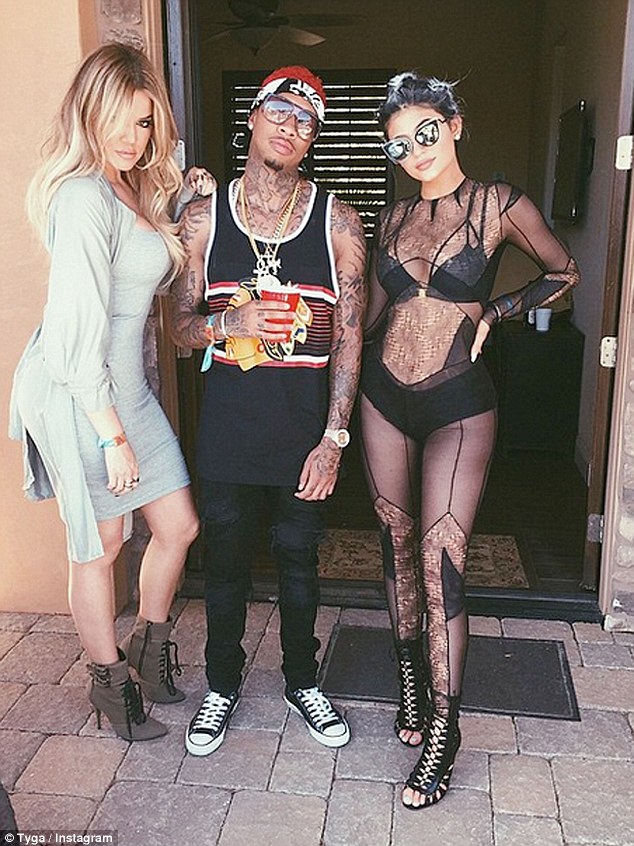 Family friend: Tyga is certainly close with the Kardashian clan having spent time with Khloe at weekend two of the Coachella Music Festival on April 19