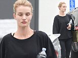 UK CLIENTS MUST CREDIT: AKM-GSI ONLY\nEXCLUSIVE: Rosie Huntington-Whiteley heads back to her car after leaving the gym in West Hollywood.\n\nPictured: Rosie Huntington-Whiteley\nRef: SPL1008500  240415   EXCLUSIVE\nPicture by: AKM-GSI / Splash News\n\n