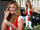 Picture Shows: Cat Deeley  April 25, 2015\n \n British television presenter and actress Cat Deeley is all smiles while out shopping at Saks Fifth Ave in Beverly Hills, California. Cat didn't let a little rain stop her from spending her Saturday morning shopping. \n \n Non Exclusive\n UK RIGHTS ONLY\n \n Pictures by : FameFlynet UK © 2015\n Tel : +44 (0)20 3551 5049\n Email : info@fameflynet.uk.com