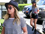 UK CLIENTS MUST CREDIT: AKM-GSI ONLY\nEXCLUSIVE: Ashley Tisdale shows off her toned legs as she stops by Earth Bar in West Hollywood for a quick smoothie run.\n\nPictured: Ashley Tisdale\nRef: SPL1015441  020515   EXCLUSIVE\nPicture by: AKM-GSI / Splash News\n\n