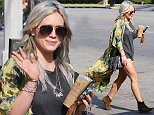 Picture Shows: Hilary Duff  May 03, 2015
 
 Singer and actress Hilary Duff looks boho chic as she stops by Starbucks in Studio City, California. Hilary, who has been busy working on her new album, recently revealed that she has been using the dating app Tinder to meet new love interests. 
 
 Exclusive All Rounder
 UK RIGHTS ONLY
 
 Pictures by : FameFlynet UK © 2015
 Tel : +44 (0)20 3551 5049
 Email : info@fameflynet.uk.com